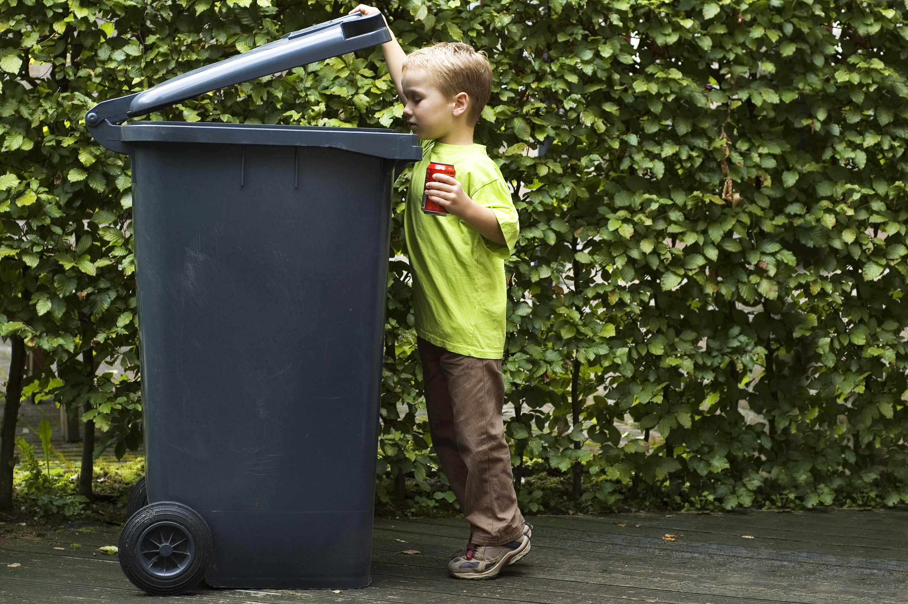 Boy Trashing A Can Boy Trashing A Can