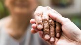 Geriatric doctor or geriatrician concept. Doctor physician hand