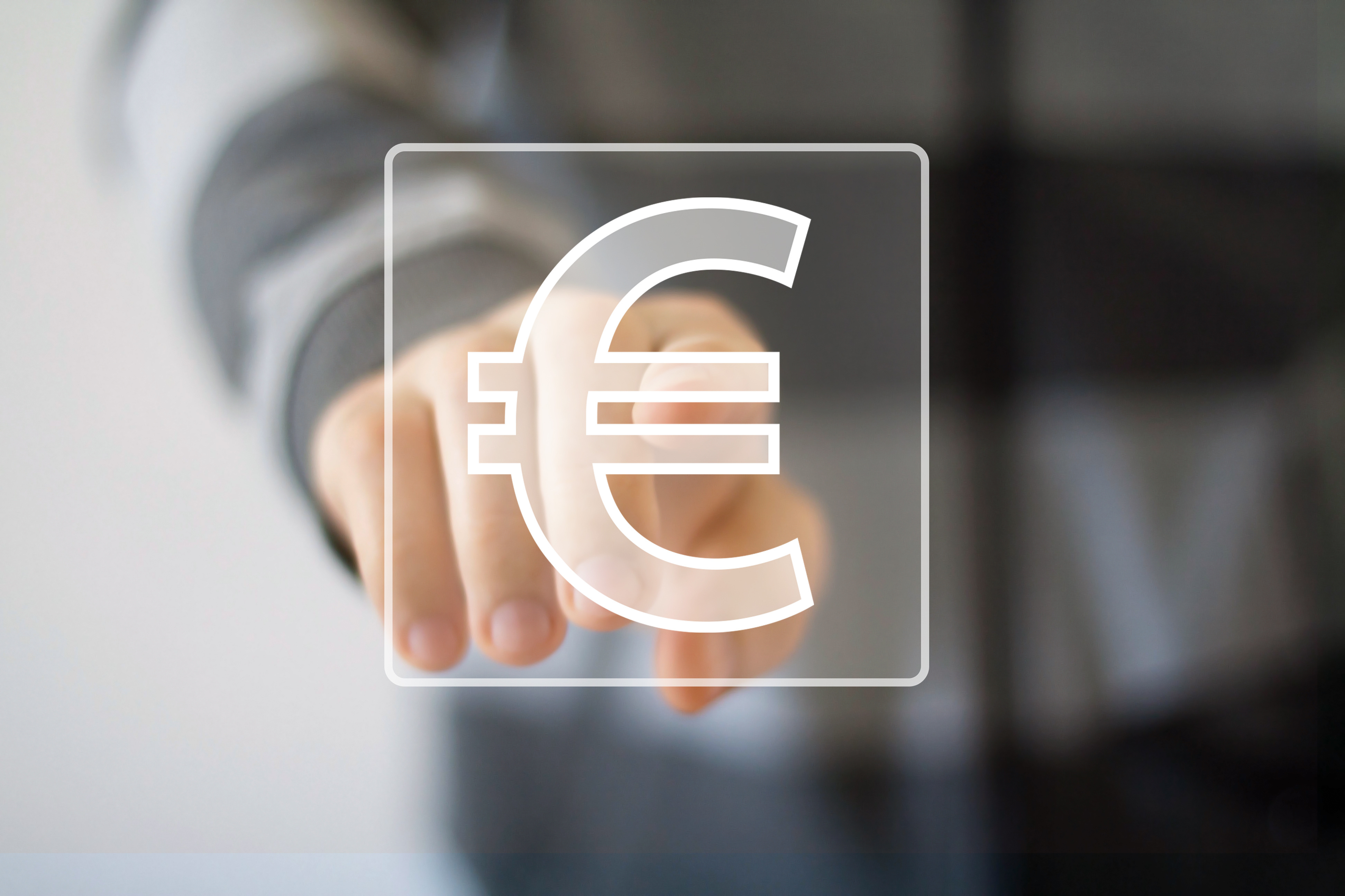 Businessman pushing button with eur icon Businessman pushing button with eur icon